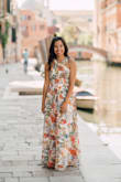 I wore this dress for engagement photos in Italy and it was perfect. I'm petite and did have the dress hemmed and straps taken in. The colors were stunning!  I got so many compliments and look forward to an opportunity to wear this dress again!! - Christina M.