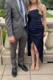 I bought this dress for a wedding, I got so many compliments on it! It's beautiful and super unique. Very flattering for any body type.

My only complaint is that the zipper was sooooo hard to get up. Not that it was tight but more so the zipper they chose for this fabric just didn't work. - Valerie C.