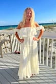 I bought this dress for our family vacation and for beach photos. The dress is comfortable and easy to put on. It is a little see-through so wear some Spanx. It fits great. I got so many compliments from the dress. Definitely was a great buy! - Cynthia D.