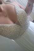 I order w other dresses from a different site and they were horrible quality. This dress came in a dress bag and a box. Such great care with the packaging. The quality of the beading and the fabric is high dollar. This dress is a total steal for the price! - Gabrielle N.