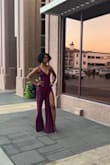 I love this jumpsuit. I wore it for my birthday dinner. The color, the fabric, and the fit were great. Super comfortable. I would've loved if the seam at the waist was a little lower because my legs are already so long, but it fit well and I felt amazing in it. - SyKnese F.