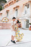Let me gush about this Yellow Lemon Dress! It swept me off my feet during my Positano photoshoot. The vibrant lemon print, playful high-low hemline, and perfect fit made me feel like a sunlit goddess. The dress's attention to detail, from the delicate sweetheart neckline to the ruffle trim, added a touch of romance. Its versatility effortlessly transitioned from day to night, making it my go-to summer favorite. This dress is pure magic, a slice of sunshine and zest. Prepare to fall head over heels in love with this dress! - Kathy T.