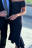 Purchased small and medium in case and small fit like a glove (with a little help from undergarment!!) but has give so walking and dancing was so easy!! Received so many compliments on the style and felt so comfortable all night! I matched it with 
Midnight Mystique Blue Sequin Beaded Clutch and was just the right finish. I wore pearls with it but can wear any jewelry or even none! Wore with nude open toe heels and matched fine too. - Missy H.