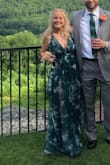 I wore this to my brother-in-laws wedding. I got so many compliments on this dress! It fit great, but it was incredibly long. With tall heels, I still had to take off a few inches. - Larissa L.