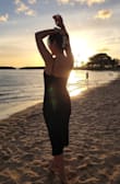 Went to the beach wearing it, the stretchy material feels good, and the slit in the front is very flattering. Perfect for a breezy summer afternoon! - Ting Z.