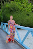Girl- let me start with saying this dress is AMAZING. It's so bright, so fun, and just the best dress for a beachy vacation. It is a little on the heavy side but you definitely don't have to worry about it flying up.
This is a wardrobe staple! - Taylor P.