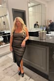 The only issue was the black dye was all over my hands. The dress fit perfectly. I didn't give it 5 stars due to dye issue. - Natacha D.