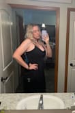 I originally ordered this in a large & the fabric has no stretch. I exchanged for an XL & it fits great! There's a small gap under the armpits but I can hide that. It is a staticky material but with spanx on underneath you can't feel it! - Lauren G.