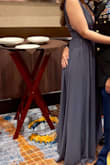 I purchased this dress for a military ball. I wanted something pretty and something that would be appropriate for the occasion. I'm 150lbs 34B ordered a small and it fit perfectly, other than the straps being a little loose but didn't show while wearing it. I'm 5'6 and was able to wear normal 2-3 inch heels with it. - Katie E.