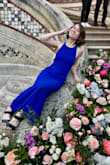 This dress was the perfect outfit to wear to an elegant/fancy wedding I went to in June. Many compliments and the mother of the bride raved about it. :) It's tight and a bit hard to get into, since it's form-fitting, but so flattering. Just be careful as you get in and out--the strap tore a bit as I got it off post-wedding. Hopefully I'll be able to repair it without the stitches looking too obvious. I did hem the dress about 3 inches, and I'm 5'8", so yes, it's long. I hemmed it myself with hem tape though and that worked great! - Miranda N.