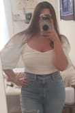 If youre a bigger busted girlie like me SIZE UP!! I am normally a medium in tops but had to exchange for a large because it was SO tight on me I couldnt breathe. the large fits much better, only downside is the sleeves are just a tad too big and slide down easily. - Jade A.