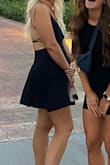 This was such a fun dress to wear in Vegas! I love the skater style. I wore black bikers under and some Nikes.
Didn't wear a bra and the material was thick enough to be just fine. - Tia M.