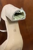 Heel broke after wearing once. It's a shame I can even return this defective item. I will never order shoes from this site again. - Julie M.