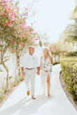 I still cant believe that I found my dream beach wedding dress online. The dress hugged my body perfectly. I did have several inches cut off the bottom since I am on the shorter side. However, it was an easy alternation. I was really nervous about the sheer shirt. I decided to just go for it. I have never felt more beautiful then I did in this dress on my wedding day. If you are thinking about ordering this dress, do it! I received so many compliments and the dress photographed beautifully. - Kelly Z.