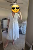 It is very comfortable, but it did feel heavy in terms of weight. It was also big around my shoulders and chest. I feel like one more button would have made it better. But I don't think I could go down a size because of how it fits around my hips/butt. - Stephanie C.