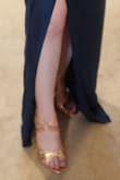 I wear heels often, usually heels about 3 to 3.5 inches high. So I thought I would be ok with these. The quality was fine but I got them for 15 dollars on sale so didn't expect much. Wore them for a church ceremony which was mostly sitting and by the time I arrived at the reception I had to change out shoes. Too steep. Half the problem is that the straps are bejeweled which makes it near impossible to wrap them tightly. - Eliana C.