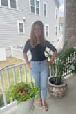 Such a great basic black top. Goes with everything and every occasion. Casual with a little sex appeal. Wear it with jeans, black slacks, mini skirt, pencil skirt, winter, summer - Ashley A.
