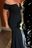 Purchased a medium and although fit well, ordered a small to compare. Went with the small which fit fantastic due to the thicker fabric (and lining) that made me feel special all night. So many compliments, not a single regret. (After an injury last year I've had 3 surgeries and had to wear a bulky knee brace which this dress WITHOUT a leg slit helped disguise). - Kristy M.