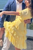 This ended up being the dress I wore to my proposal and I loved it - the color is vibrant, the skirt adds volume and creates shape from the waist. There is extra gaping in the bust however. - Gabrielle M.
