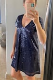 I bought this as an option for the Eras tour, but it wasn't flattering. It looked like a sequined nightgown. It was very flowy and was comfortable and not scratchy, but I didn't like how it looked. - Jane E.