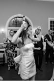 I wore this dress at the end of my wedding reception and for our exit and the end of the night and it was perfect! Not too short, stays up well, and looked great in photos! - Madison-Grace F.