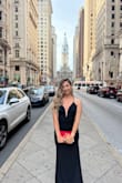 I tried on a lot of dresses and this was the one that flattered my body the most. The fabric is thick but I didn't feel warm. The dress was highly praised and is my favorite. - Giovanna B.
