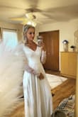 I ordered this dress for my wedding and I fell in love with it as soon as I tried it on. It is so sweet and simple, it gives the perfect mixture between elegance and class. Only complaint is that is was a little long on me and I didn't have time to get it altered& other than that it was perfect and exactly what I was looking for. - Jill P.