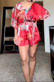Love this romper! I got my normal size XS and it was perfect. Plan on wearing it for my upcoming vacation. Color is nice and bright and very light weight. - Amy V.