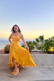 Super cute and flowy, I felt like Belle from Beauty and the Beast! The only problem is the strings in the back. It's very hard to get the strings to go just right, and tighten do your boobs don't fall out. I guess my strings were a little too tight and one busted and my boob popped out anyways. Did a quick sewing job and went back to dancing at least. - Andrea S.