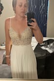 This is such a gorgeous and detailed dress. I always envisioned myself wearing a lace wedding dress, but this dress easily changed my mind. The detailing in the beading is amazing. It looks even better in person. I am obsessed and cannot wait for my wedding! - Ashley B.