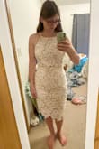 This was my favorite dress I purchased for my wedding rehearsal dinner. It's slightly tight over my hips but I know if I sized up, the bust would be much too large. I'm hoping it doesn't ride up too much while wearing. - Kimberly W.