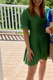 Flowy and flattering, the vneck is flattering and there is a little metal button between the top two to ensure there is no gap. The tie in the back helps cinch the waist while not being too tight. I have in green and red, and can be easily dressed down with sandals/sneakers or up with a wedge. - Erica W.