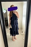 Loved the dress for a summer wedding. The tiers are cute and their movement is so fun when dancing. I had to pin the back a little to tighten around the bust and I would have liked the arm holes a little higher cut, but overall a great choice. - Emily L.