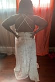 The dress is great quality but the strap did not flatter my back ,that's they reason why I decided no to go with it . If the straps was more thicker and offered more support I would of kept it. - Merayna D.