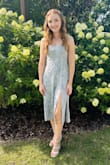 Absolutely loved this dress. Got so many compliments on it! Looks exactly like the picture and the material is nice. I based my size off of the model. Normally I would order a medium, but Im very glad I ordered the small it fit perfectly! - Madison G.