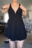 This dress is super cute and a great go to LBD option! The back of the straps are a little loose so I will have to take those in a little. This dress is on the shorter side but when I did the twirl test nothing showed! Very cute dress! - Kelcee B.