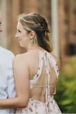 Bought this dress for engagement photos and was so happy with it! The length and material were perfect and the back is just too cute. The tie straps make it adjustable around the bust and neck so I could tighten it up a bit. - Cecilia P.