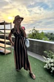 Love this cover up that doubles as a dress! Wore this to a pool party and afterwards it seamlessly transferred to a night out on the town. The style is classy but the low neckline and side slits make this sexy. - Stefanie I.