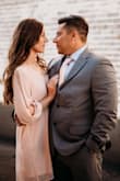 I received many compliments on my dress during our engagement photoshoot. I think this dress could have been dressed down or dressed up. Very universal look. I dressed it up and had jewel studded strappy sandals which looked fabulous! Very comfortable and flowy and kid of boxy, but that's the style. Love this dress! - Britney C.