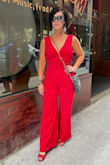 Talk about a head-turner! This color of red on this jumpsuit is so stunning and gets a lot of attention.  The jumpsuit has some stretch and is sexy.  The material is great quality with a sturdy back zipper.  I love it! - Michelle T.