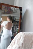 The dress was super pretty. I purchased a size larger than needed as I am pregnant and expect to start showing any day now. I am getting married at the beginning of September and planning for it to be very hot. This dress is just a little heavy for a hot summer wedding. - Sarah F.
