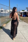 I was the center of attention in this dress for sure. If you have a nice figure and not afraid to show it - go for it. It is very revealing, though. - Diana L.