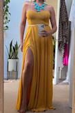 This yellow dress fits like a dream!  It runs true to size.  The ripples around the bust are a fun, added detail.  The dress looks and feels high-quality.  The weight of it makes it move beautifully.  It is perfectly long enough to wear a heel for any special occasion.  The slit is placed exactly where it needs to be to show a little leg when you walk.  I'm very excited to feel confident in this dress at the wedding! - Makenzie C.