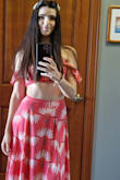 Fits me perfect and I feel beautiful in it! I think it's perfect for a trip to Hawaii or the Carribean or just a party. The skirt is long but comfortable. - Pam B.