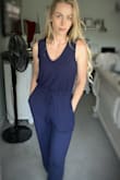I like the material, it's thick so it hangs nicely and the fit is what you'd hope for in a casual jumpsuit. The pockets are a bonus. I love it. - Ali S.
