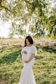 Loved this dress! Since I used it for a Maternity Photoshoot at 8 months pregnant, I sized up 1 size from my pre-pregnancy size. - Yadi C.