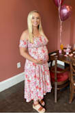 This was a perfect dress for my Baby Sprinkle! It fit great and is very bump friendly. I was very comfortable in it and I also love the pop of color. I'm normally a Small for size but ordered a Medium to accommodate for the bump; sizing was spot on. - Jena W.