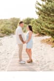 Material is extremely comfy! Make sure to go up a size. I originally bought a large, but it was on the smaller size and there is no stretch in the material. Extremely cute on! I bought this dress for my engagement photos. I really love it! Most importantly, I didn't need I wear a bra with it! - Mimi C.