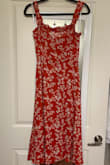 Very pretty in person and fits true to size, but the color is more ruddy in person - might work better as an early fall dress. - Skyler R.