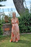 I wore this dress to my Nephew's destination wedding in Italy.  It fit like a dream, and I received several compliments from perfect strangers before I even got to the venue.  Very comfortable, well-made, and reasonably priced. It needed a few slight alterations, it was way too long, but the important parts were perfect and true to size. - Janis B.